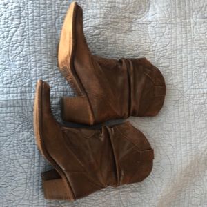 Mustang cowboy boots-made and purchased in Spain.